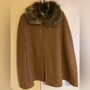 Women’s cape with faux fur collar. Worn once.